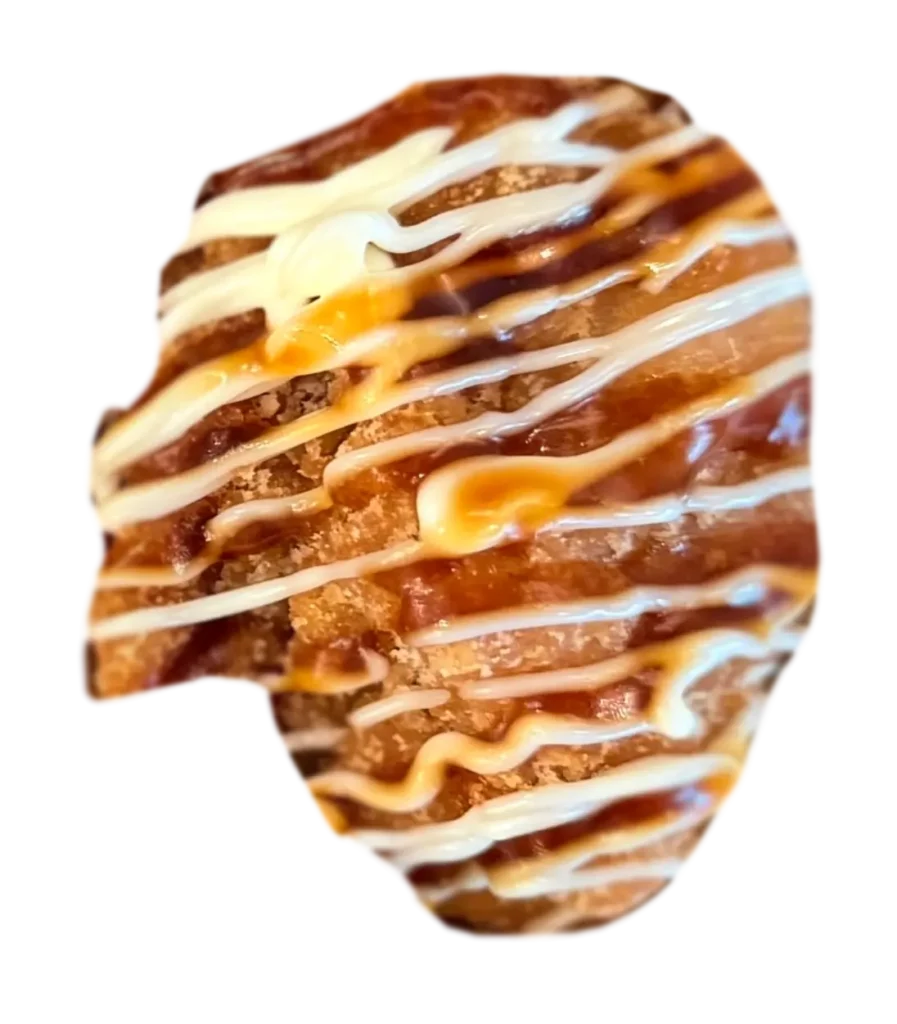 A piece of beef with sauces